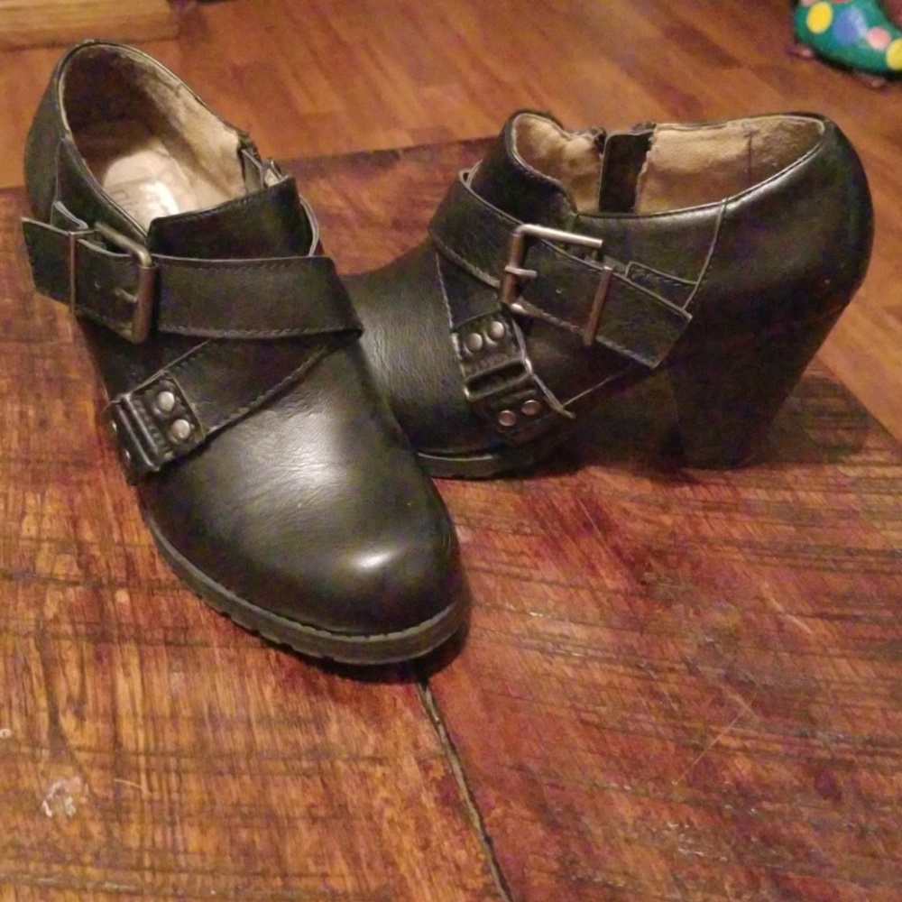 Nicole black buckled booties.